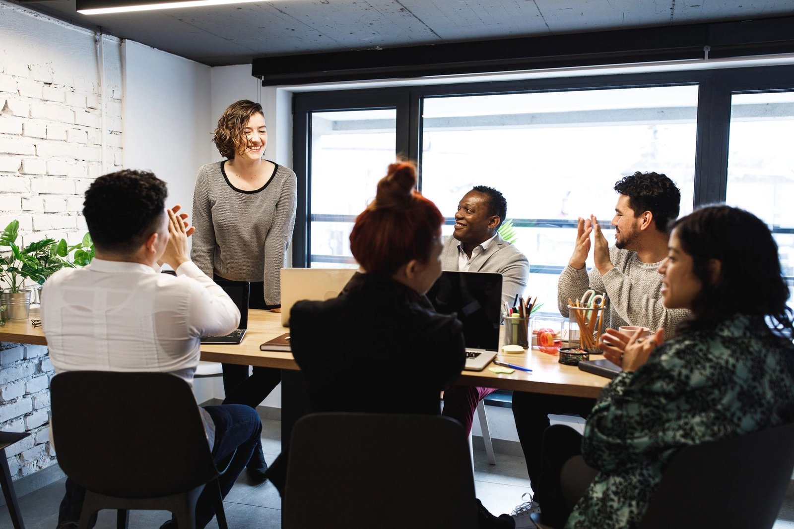 Business team celebrating success in a conference room
