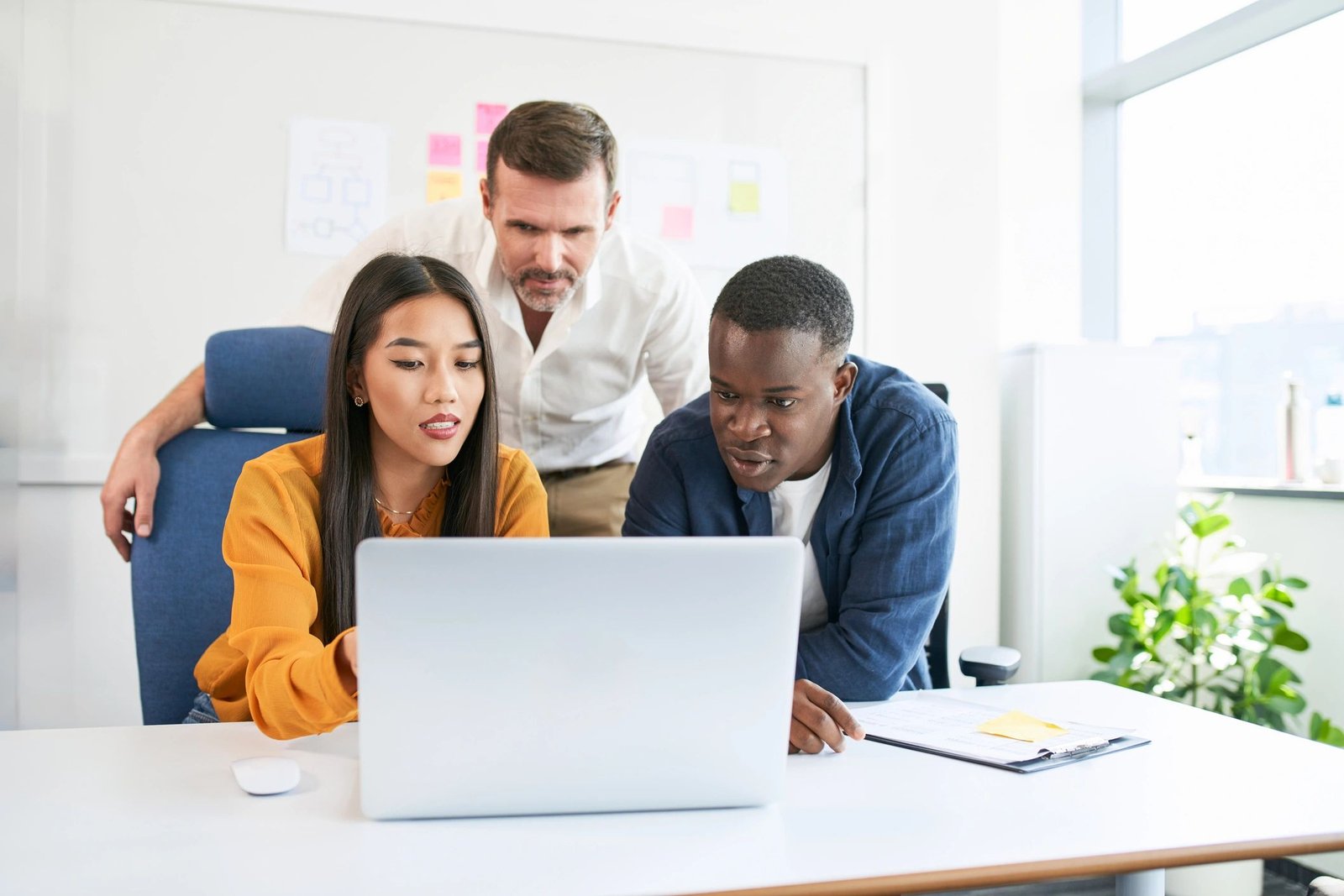 Diverse business team collaborating in a bright modern office